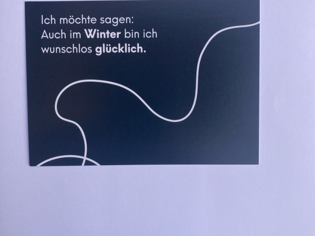 Schriftzug: Ich möchte sagen: Auch im Winter bin ich wunschlos glücklich